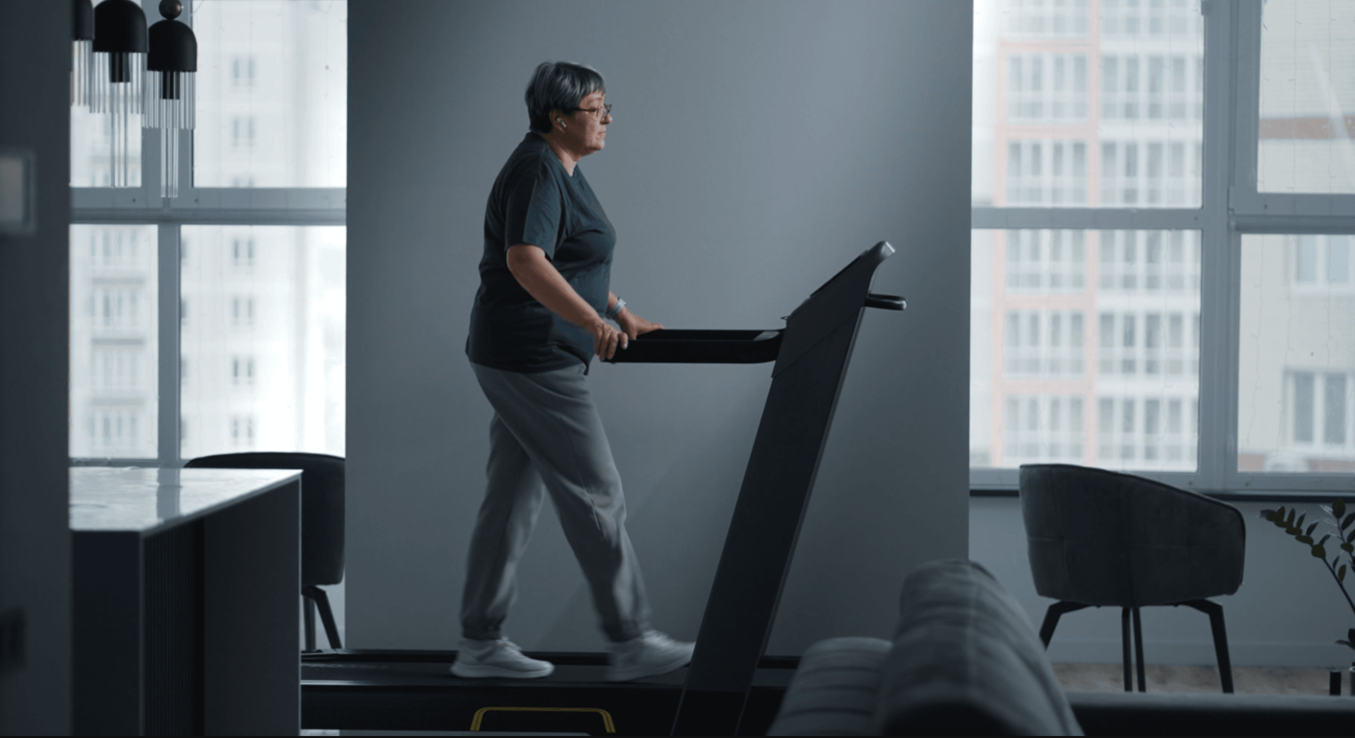 A woman walking on a treadmill