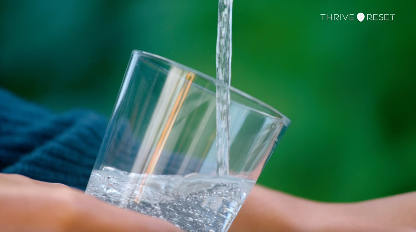 A glass filling with water