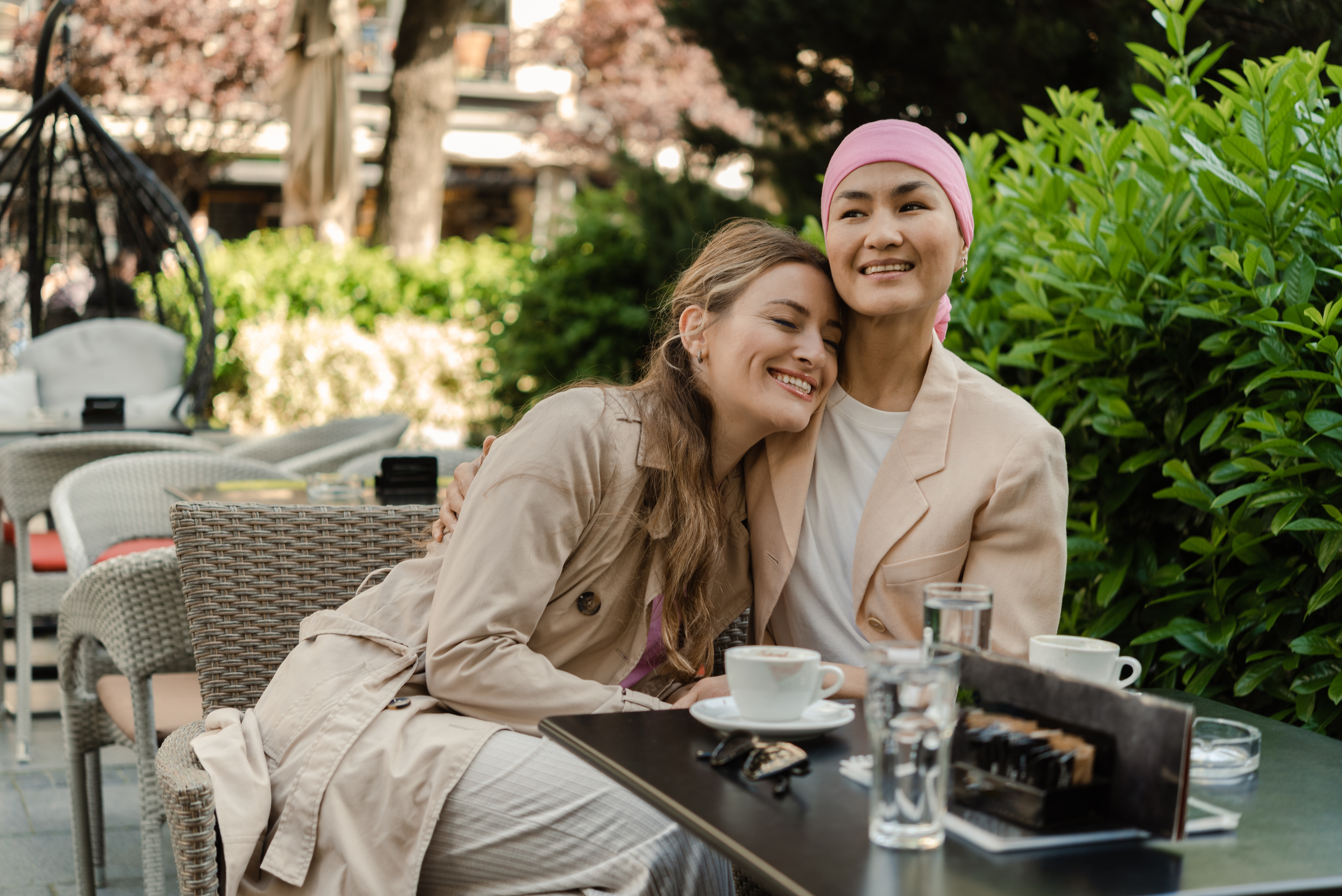 Two women friends having coffee together